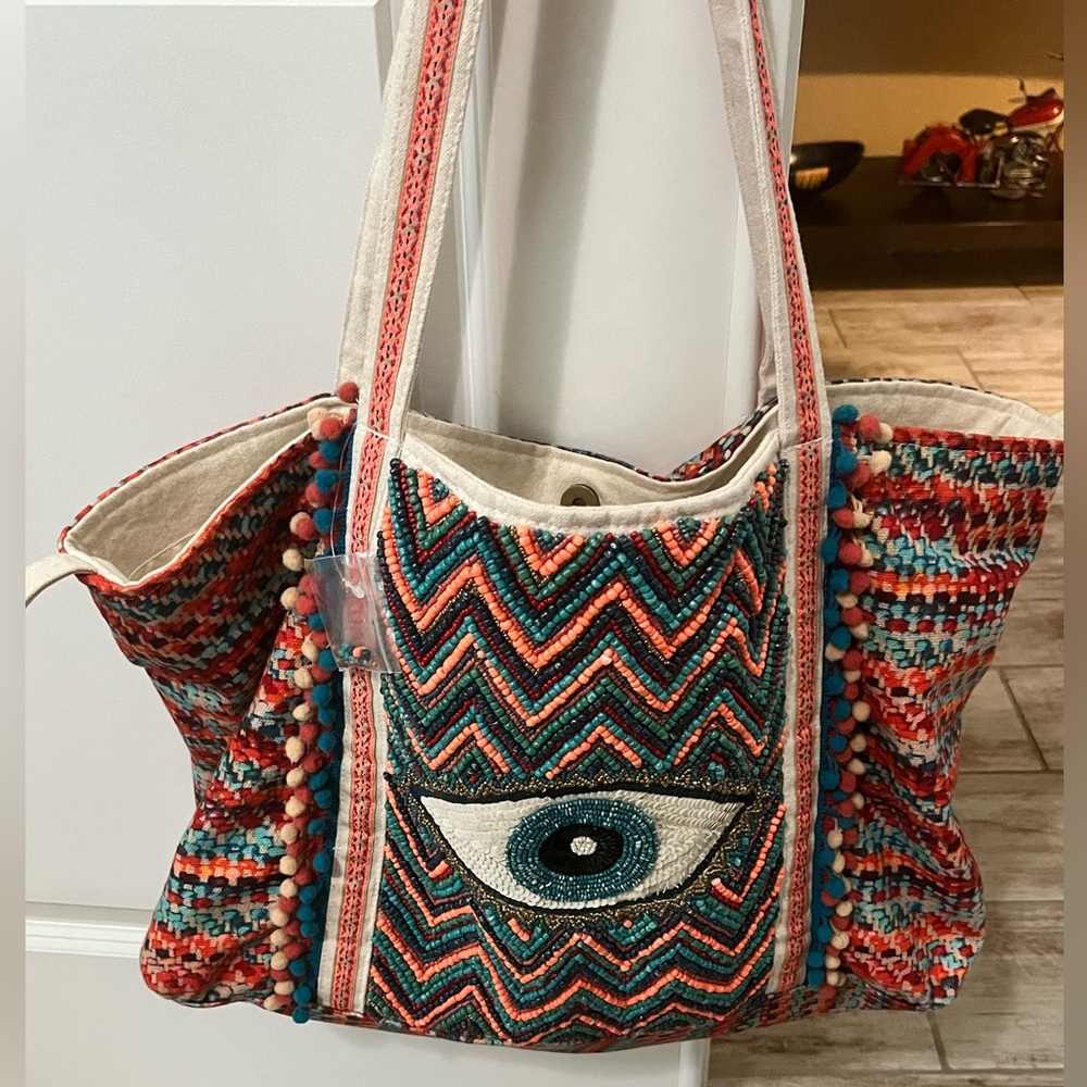 America and Beyond evil eye beach bag.  Great condition